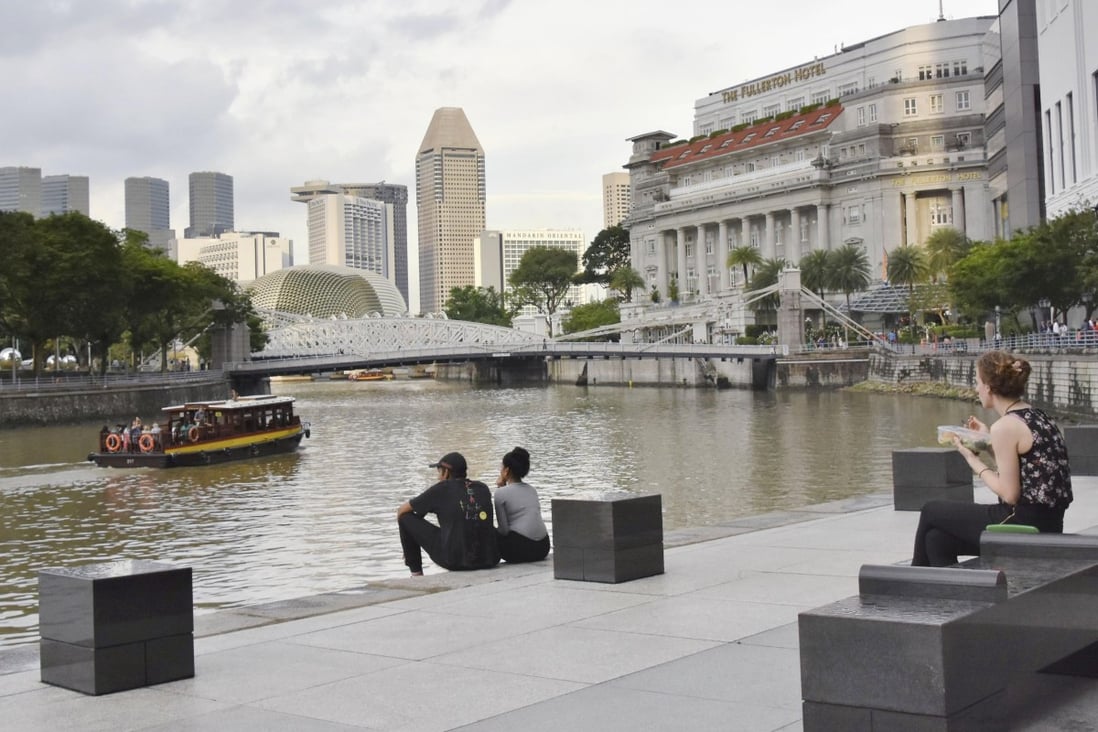 Singapore has developed a very comprehensive and robust social security system, covering housing, health care, education and retirement – all of which remain top concerns in China. Photo: Kyodo.