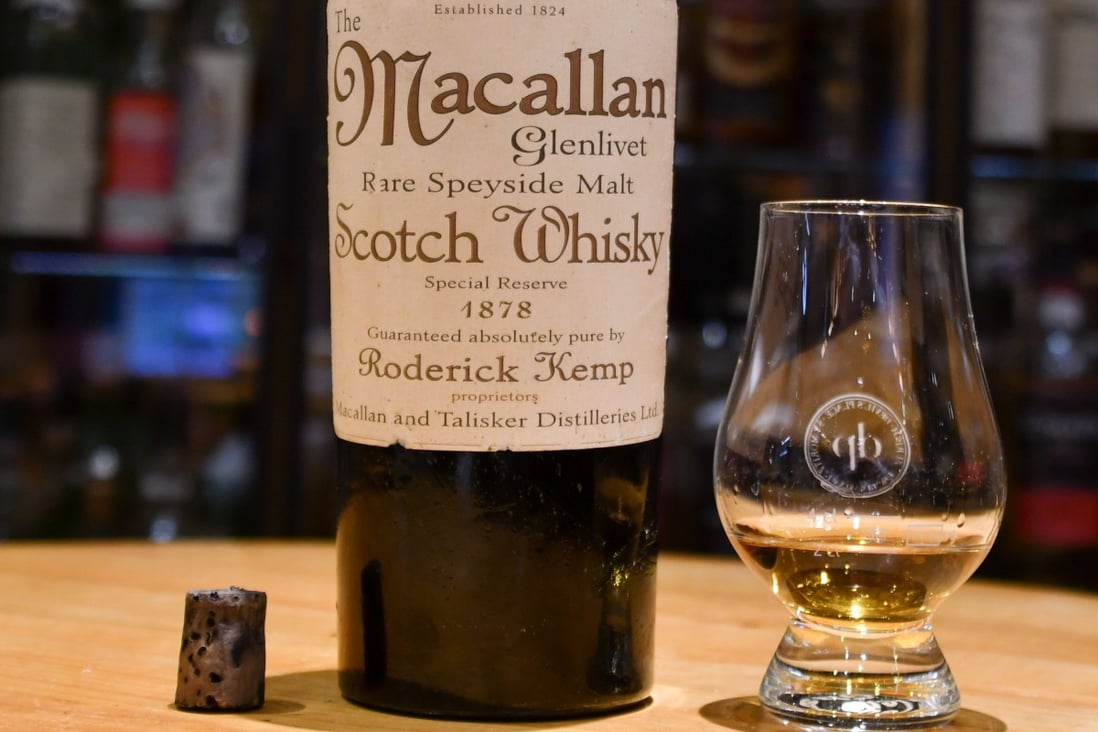This file handout photo by the Hotel Waldhaus am See in St Moritz shows a bottle of whisky labelled as having been made in 1878 by the revered Scotch maker Macallan, at the hotel's Devil's Place Whisky Bar. But the whisky was actually distilled between 1970 and 1972. Photo: AFP