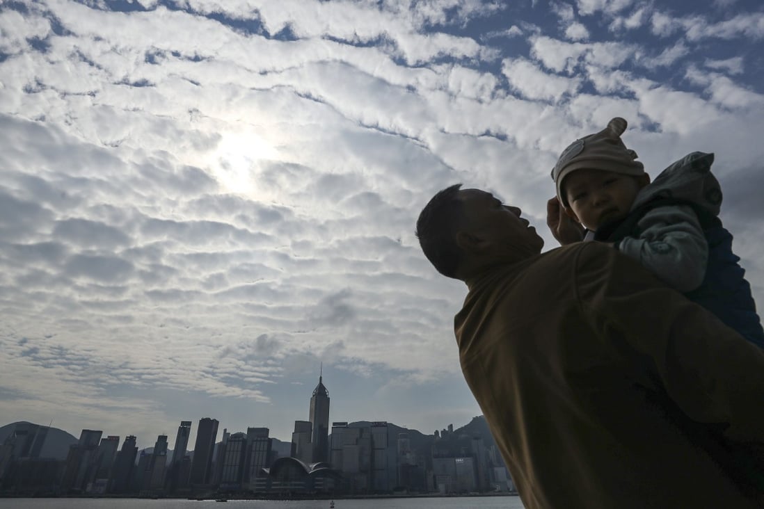 Hongkongers dress for the weather on Saturday. Photo: Winson Wong