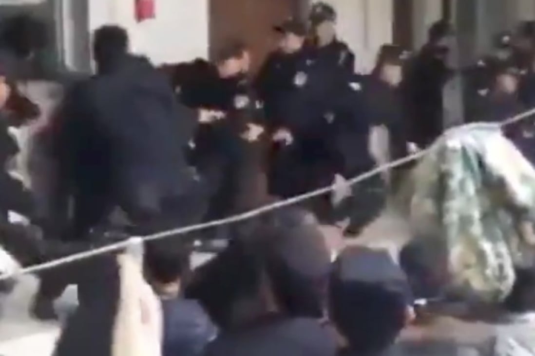 Video footage captured police officers harassing Hui Muslim worshippers after Chinese authorities ordered three mosques in Weishan country, Yunnan province, chained shut to await demolition. Photo: Handout