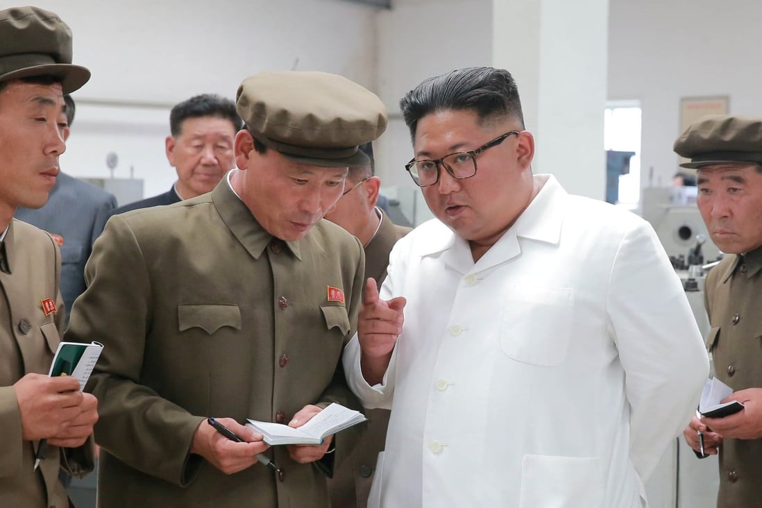North Korean leader Kim Jong-un gives field guidance during his visit to a machine factory under the Ranam coal mining complex. Photo: Reuters