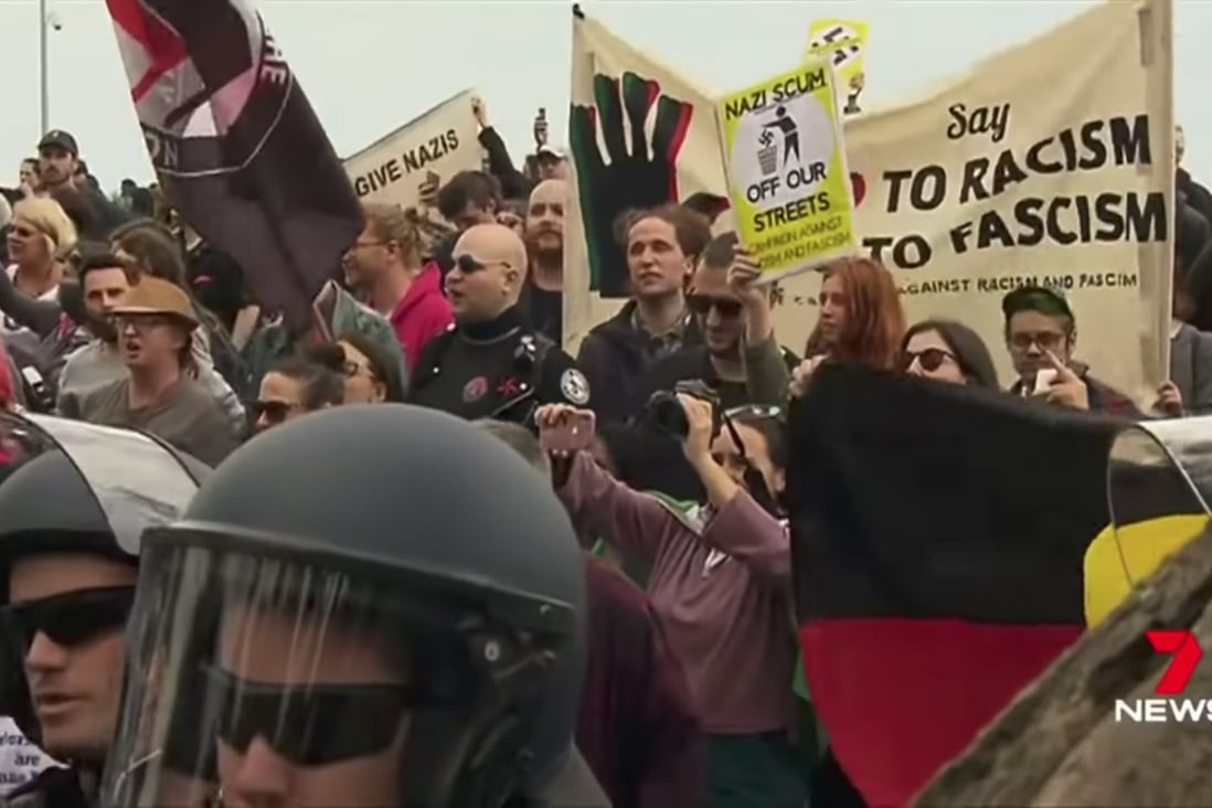 Tensions reached boiling point at St Kilda beach in Melbourne as hundreds of far-right wing extremists and anti-racism campaigners faced off in a screaming match. Screen capture: 7News