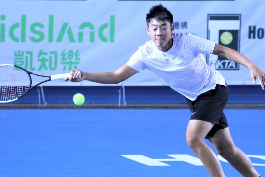 Coleman Wong returns the ball at the Kidsland M25 World Tour series at Victoria Park. Photo: Chan Kin-wa