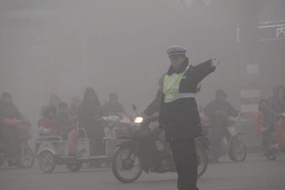 Heavy fog in the city of Anyang, in the industrial Henan province. Photo: CFP