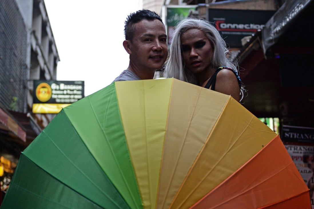 Members of the LGBT community in Thailand gather in front of a bar in Bangkok in June 2016, during a vigil for victims of a shooting in a gay club in the US city of Orlando, Florida. The Thai government backed a same-sex civil partnership bill in December 2018. Photo: AFP