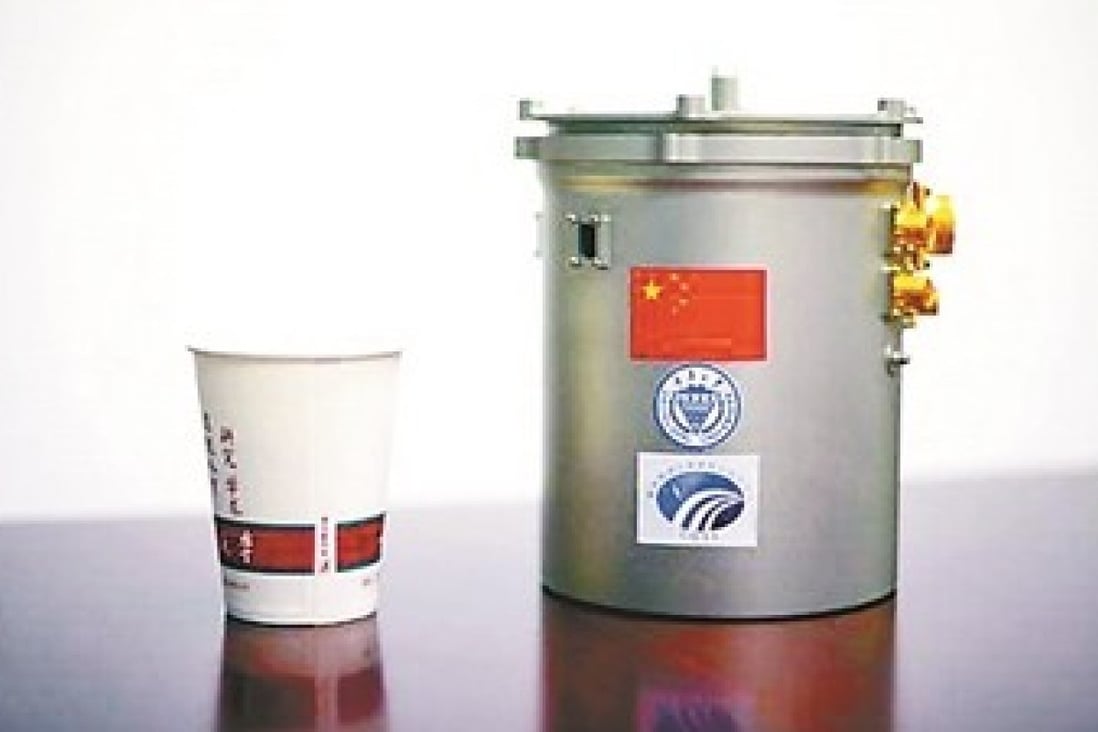 China has planted a canister on the moon that it hopes will produce the first flower on the lunar surface. Photo: CNSA