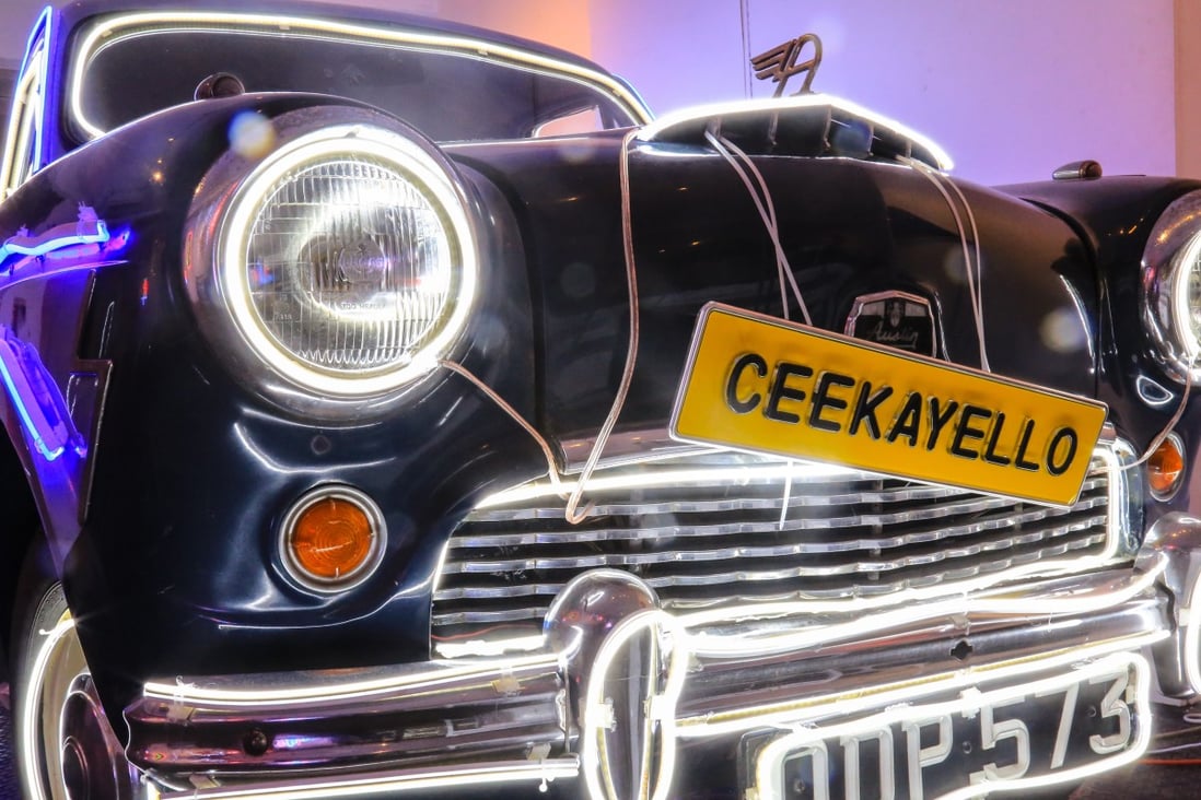 A retro taxi wrapped in neon lights, the work of creative studio Ceekayello, on display at Kong Art Space in Hong Kong’s Central district. Photo: Vivian Yan