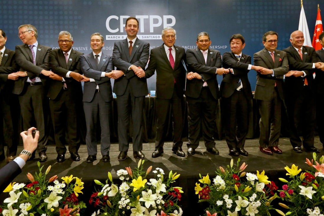 Ministers pose for a pictures after the signing ceremony of the Comprehensive and Progressive Agreement for Trans-Pacific Partnership, CPTPP, in Santiago, Chile. Photo: Associated Press