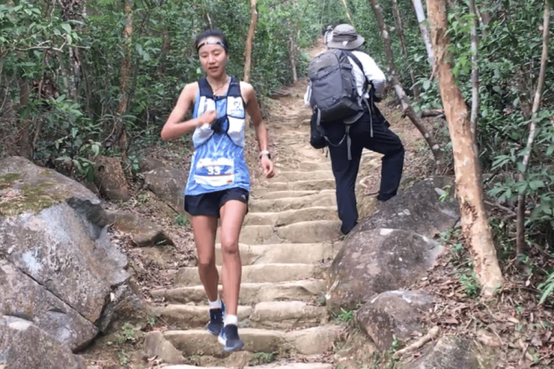 Yangchun Lu descends into checkpoint five far ahead of the second woman, but it was not until the final 3km that she thought she would win. Photos: Mark Agnew