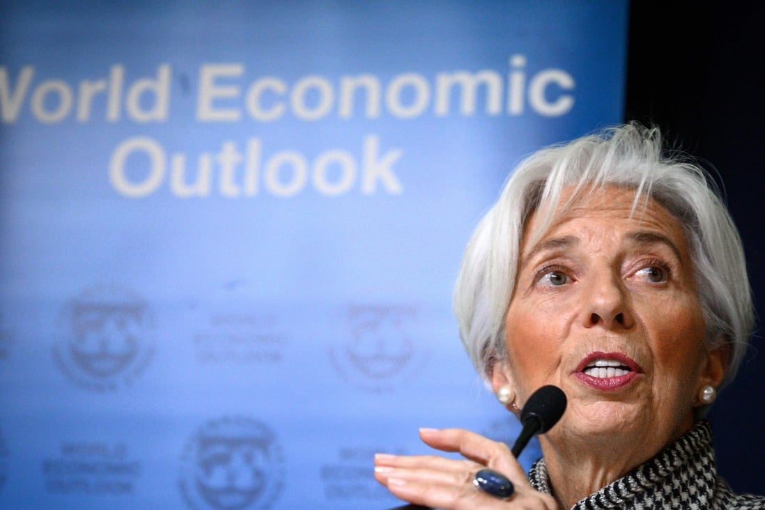Christine Lagarde, managing director of the International Monetary Fund, presents the IMF World Economic Outlook ahead of the World Economic Forum annual meeting on Monday in Davos, Switzerland. Photo: AFP