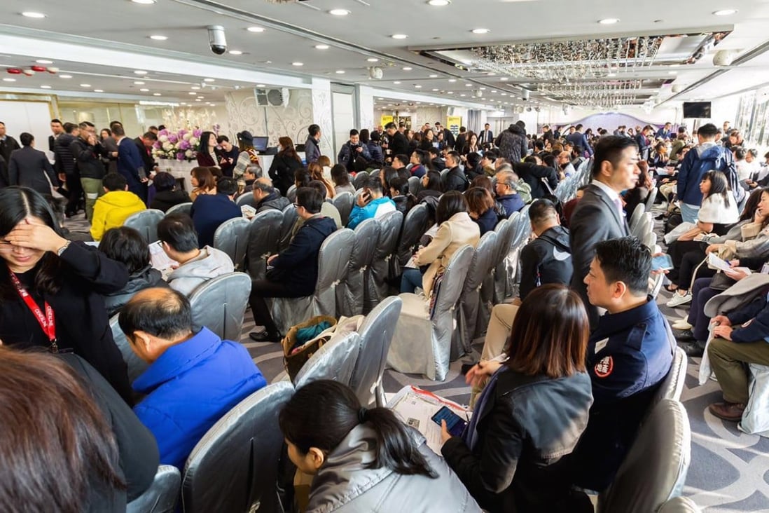Buyers line up for the 228 apartments on offer at the Mayfair By The Sea 8 development from Sino Land, in Hong Kong’s Tsim Sha Tsui district. Photo: Handout
