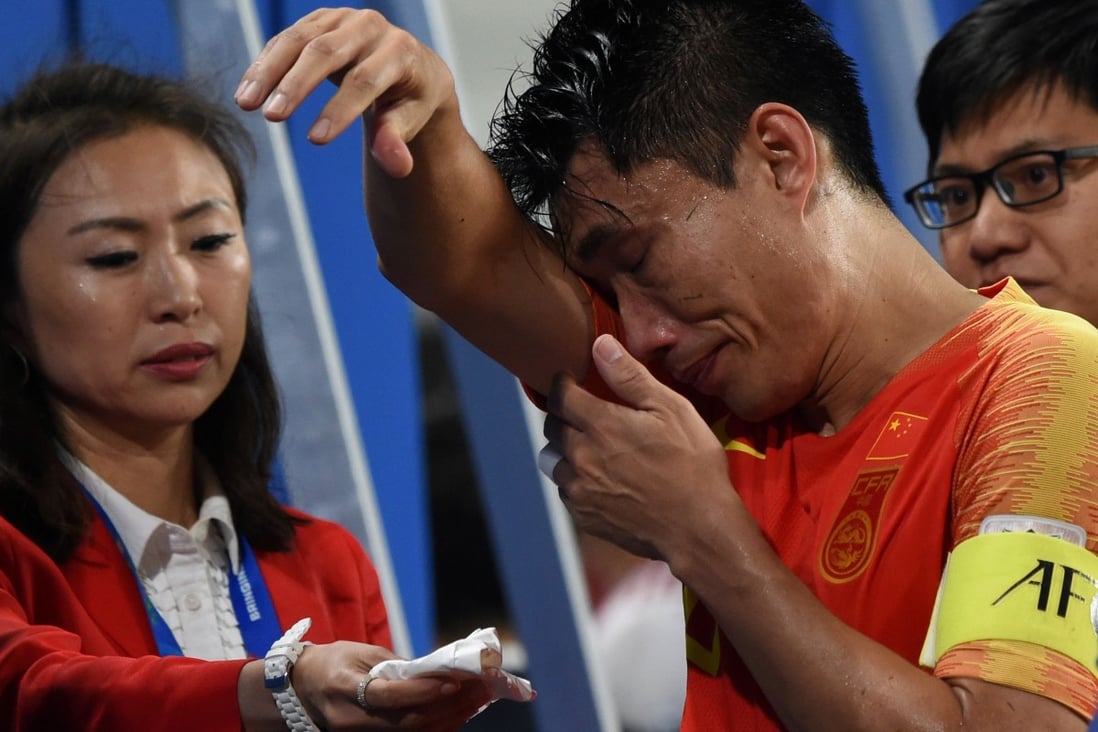 China midfielder Zhi Zheng is in tears after China’s Asian Cup quarter-final exit. Photo: AFP