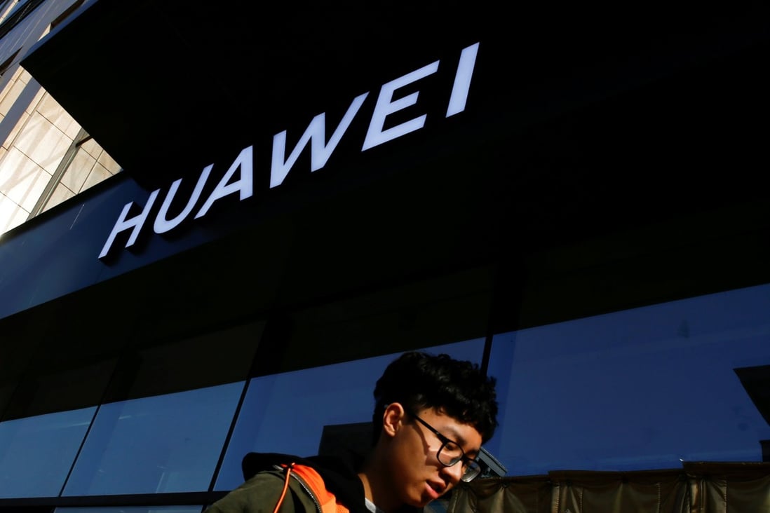 A man walks past a Huawei shop in Beijing, China. Photo: Reuters