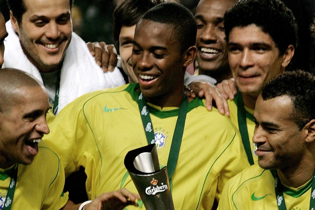 Brazil’s players celebrate after winning the 2005 Carlsberg Cup. Photo: AFP