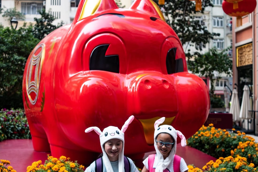 Children out and about for the Lunar New Year festivities. Photo: AFP
