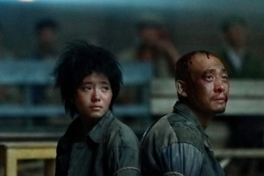 Zhang Yimou’s One Second depicts a man who escapes a prison farm in northwestern China in the 1970s – because he desperately wants to see a film – and an orphan he meets along the way. Photo: Handout