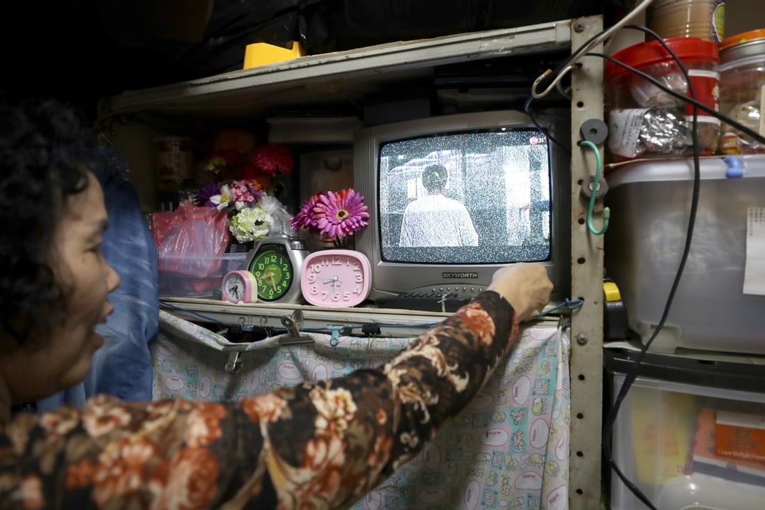 Ms Cheung, a 60-year-old woman who suffers from poor eyesight, hopes the government can give her adequate subsidies to get her a new TV set. Hong Kong is to end its analogue TV services in 2020. Photo: Winson Wong.