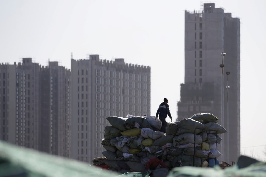 Apartment blocks under construction in the outskirts of Beijing. A poll by Huatai Securities found that only four cities had posted growth in sales year on year during the February 4-9 period. Photo: Reuters