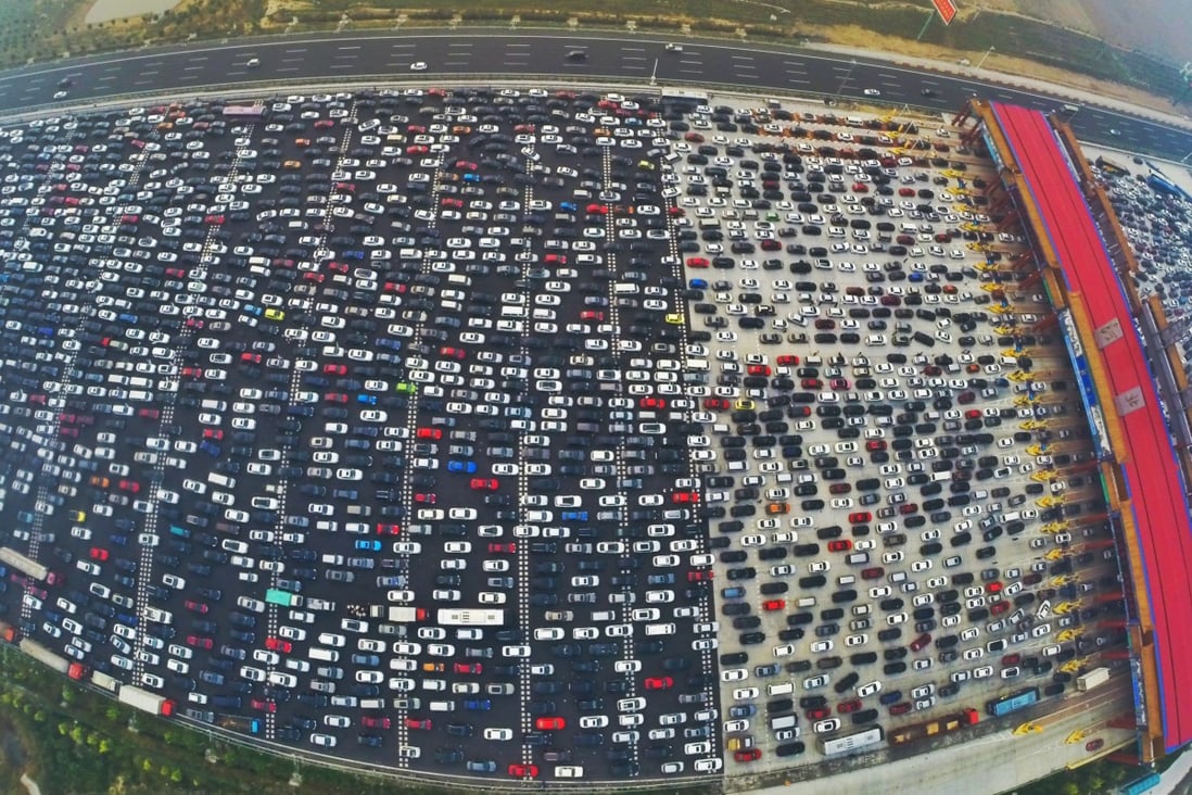 China’s motorways become a sea of slow-moving traffic during the Lunar New Year holiday period. Photo: ChinaFotoPress