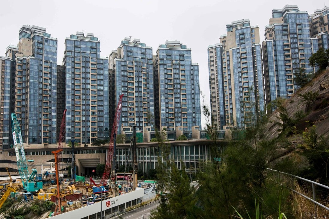 Hong Kong home builders such as CK Asset Holdings have hinted they will cut prices of new homes should the general market trend lower. Newly constructed residential buildings taking shape in the Kowloon district of Hong Kong. Photo: AFP