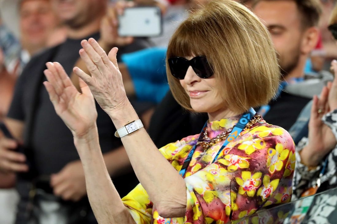 Anna Wintour applauds after Serena Williams’ match against Simona Halep at the Australian Open, in Melbourne. Picture: Reuters