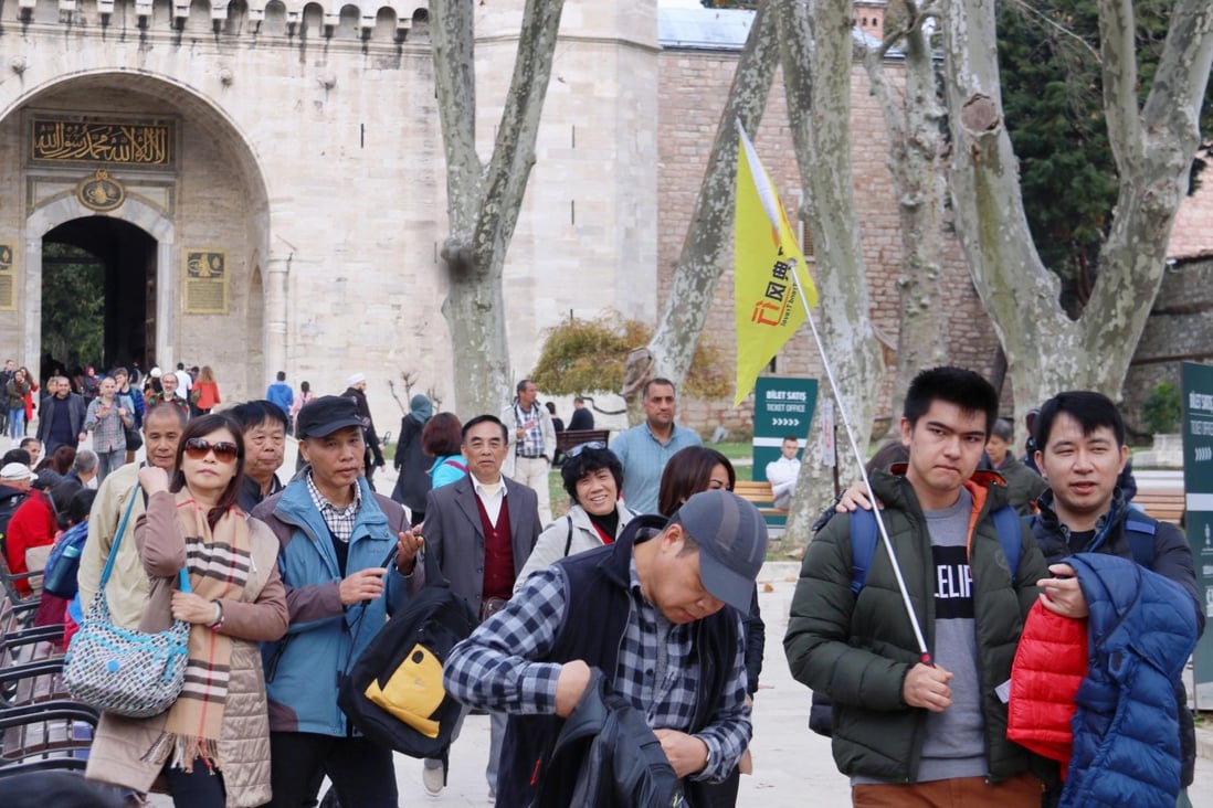 Chinese tourists at the Topkapi Palace in Istanbul. Photo: Kyodo