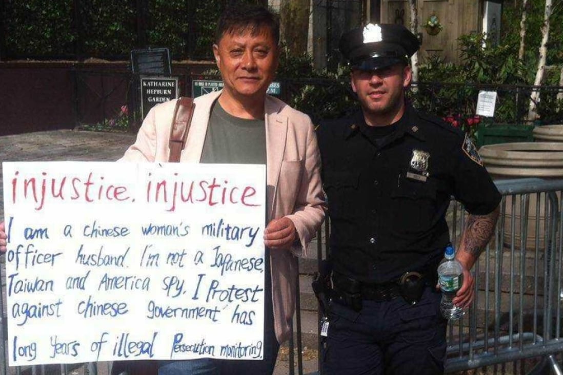 Bai Jiemin poses for a photo with a New York police officer outside the United Nations headquarters in 2017. Photo: Handout