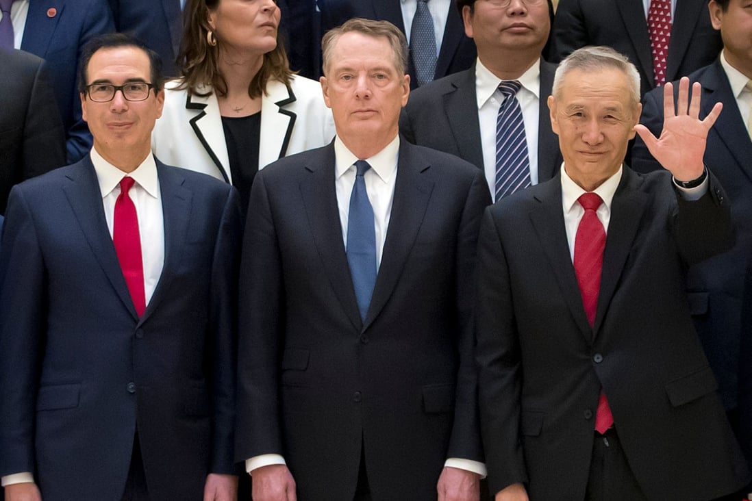Chinese Vice-Premier Liu He (right) waves alongside US Treasury Secretary Steven Mnuchin (left) and Trade Representative Robert Lighthizer in Beijing on Friday. Photo: AFP