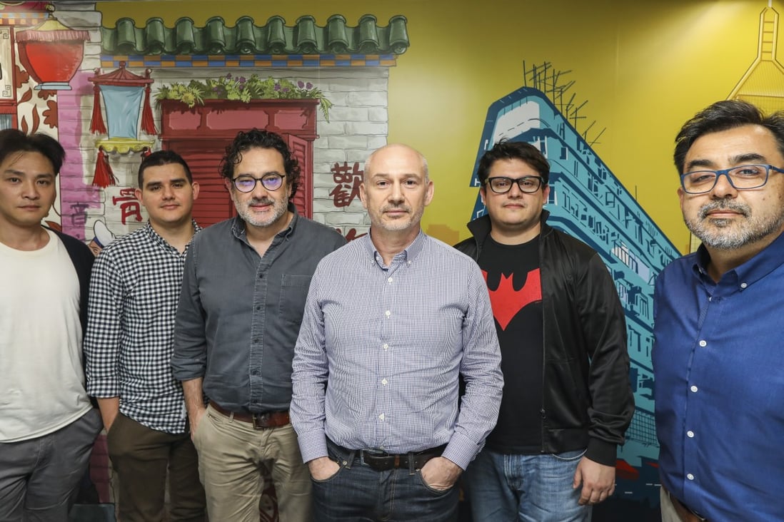 Dennis Wong (infographic designer), Pablo Robles (infographic designer), Adolfo Arranz (deputy head, graphics and illustration), Darren Long (head of graphics and magazine design), Marco Hernandez (digital design director), and Marcelo Duhalde (infographic designer) at the Post’s office in Causeway Bay. Photo: Roy Issa