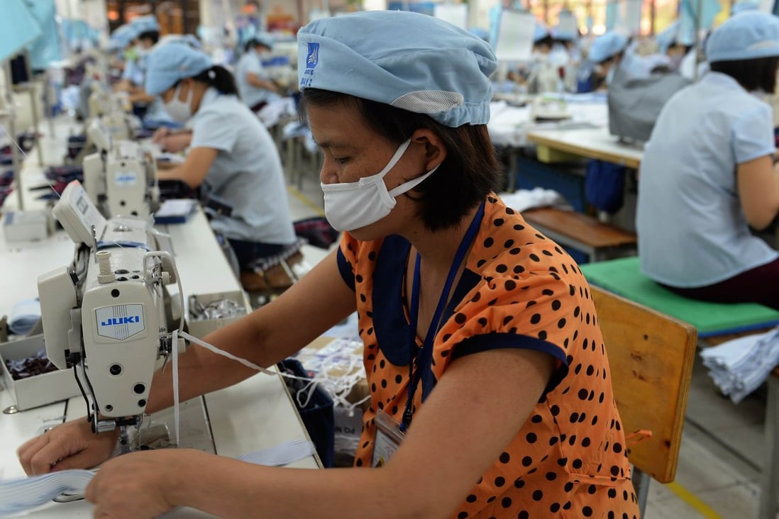 Vietnamese workers at a garment factory in Hanoi. Photo: AFP