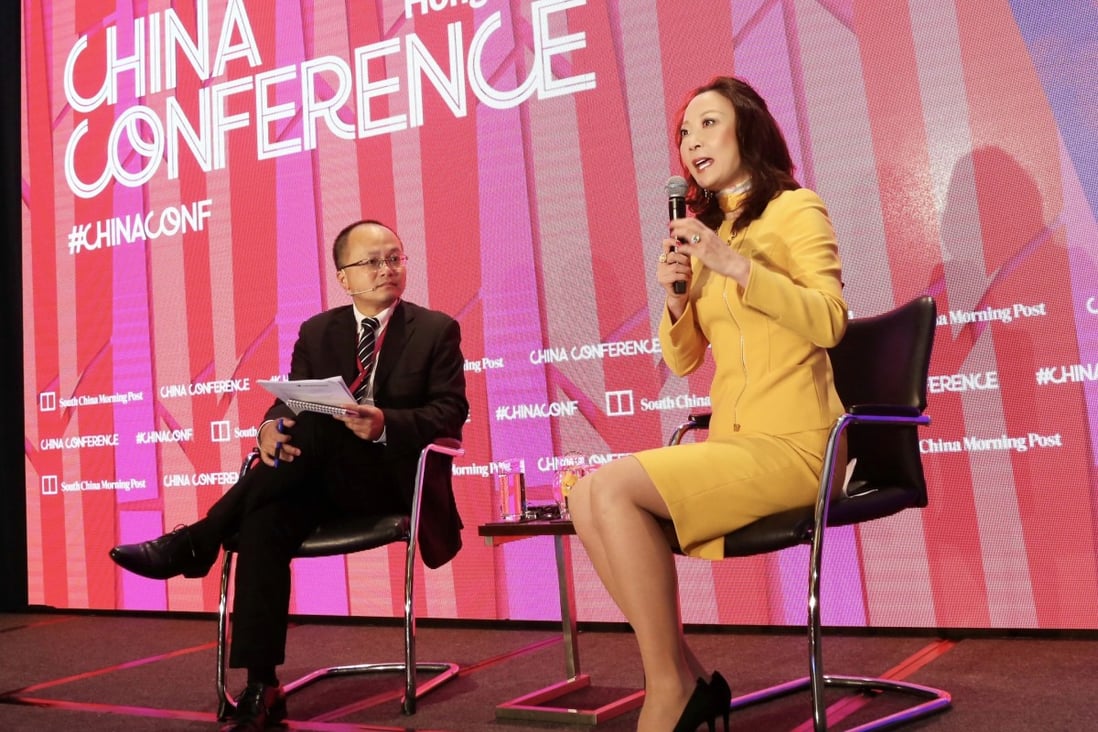 SCMP Deputy China Editor William Zheng with JP Morgan Chase Jing Ulrich, Ulrich says personal consumption has been a big driver of China’s growth. Photo: Nora Tam