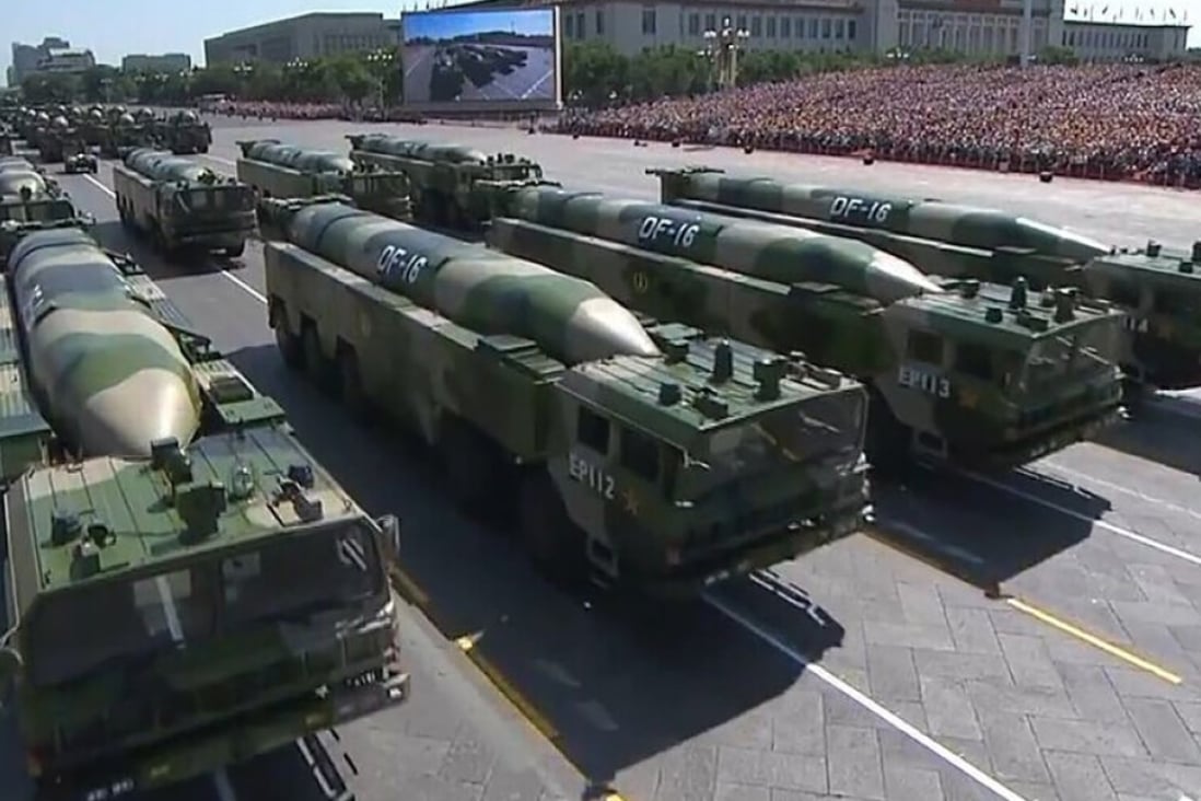 Military vehicles carrying DF-16 ballistic missiles take part in China’s National Day parade. Taiwan says Beijing has such missiles trained on the self-ruled island. Photo: Handout