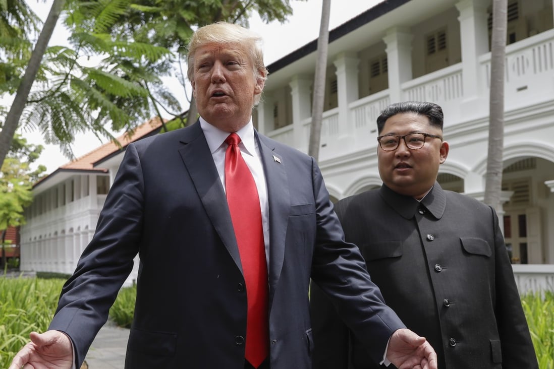 US President Donald Trump and North Korea’s leader Kim Jong-un talk with the media during their summit in Singapore last year. Photo: AP