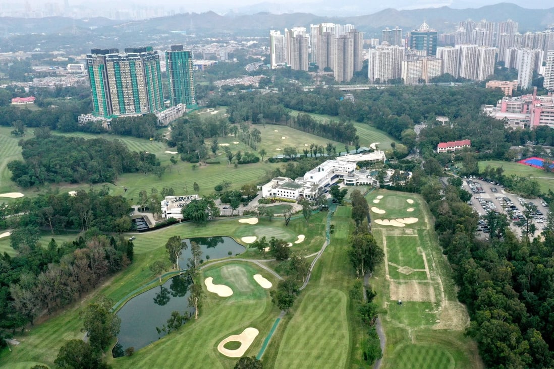 Blocks of flats form the backdrop for an aerial drone view of the Hong Kong Golf Club in Fanling, about a fifth of which is about to be taken back for public housing. Photo: Roy Issa