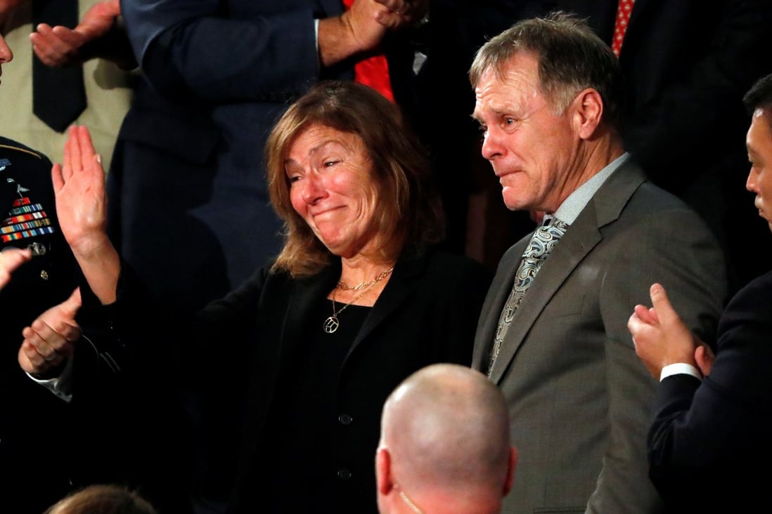 American student Otto Warmbier’s parents Fred and Cindy Warmbier weep during the 2018 State of the Union address as US President Donald Trump talks about the death of their son after his arrest in North Korea. But they are now blasting Trump’s “lavish praise” of North Korean leader Kim Jong-un. Photo: Reuters