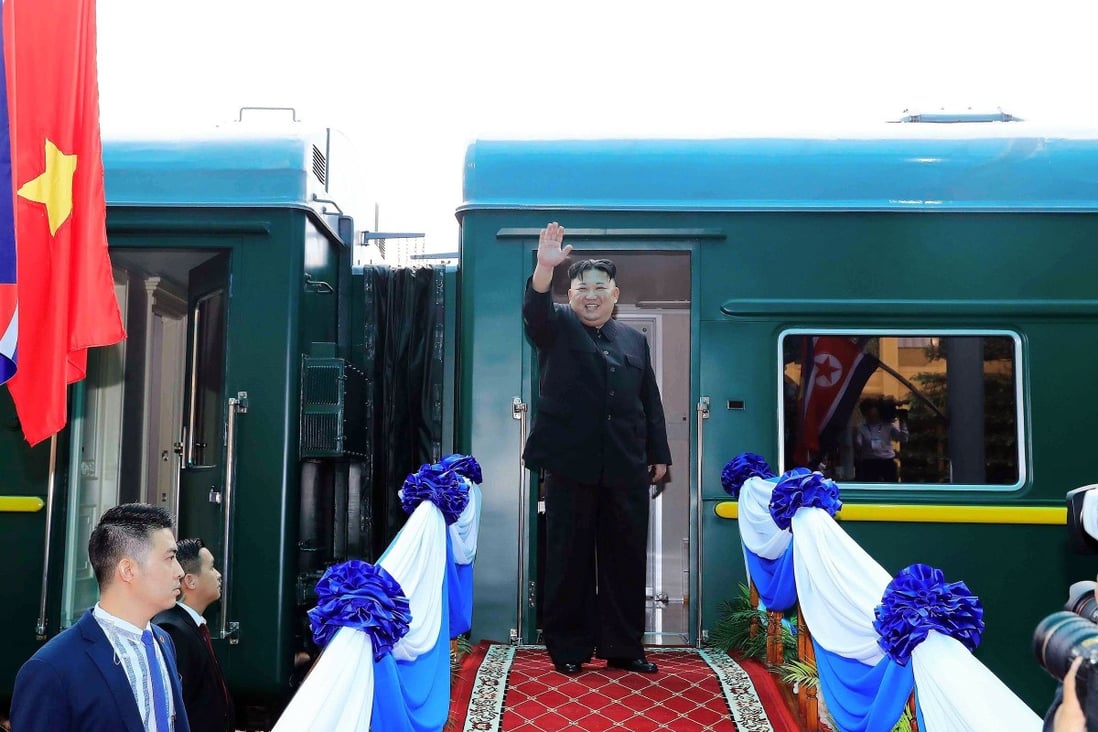 North Korea's leader Kim Jong-un waves before boarding his train at the Dong Dang railway station in Lang Son on March 2. Photo: Vietnam News Agency/AFP