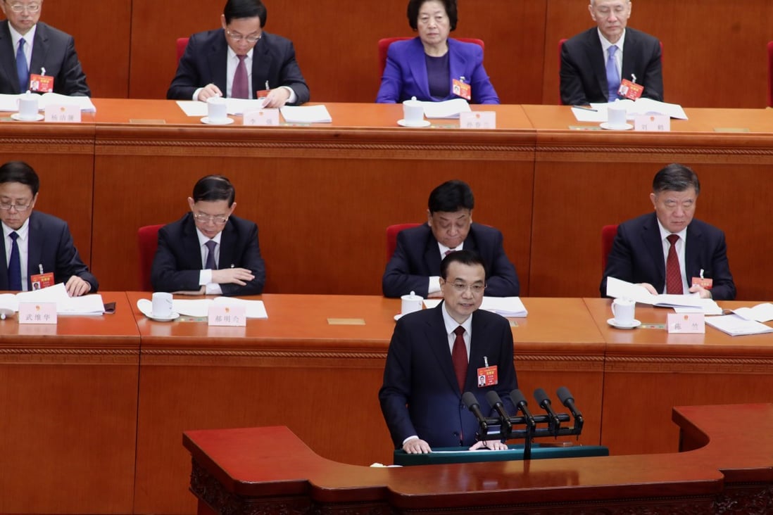 Premier Li Keqiang delivers the government work report in the Great Hall of the People in Beijing on Tuesday. Photo: SCMP/Simon Song