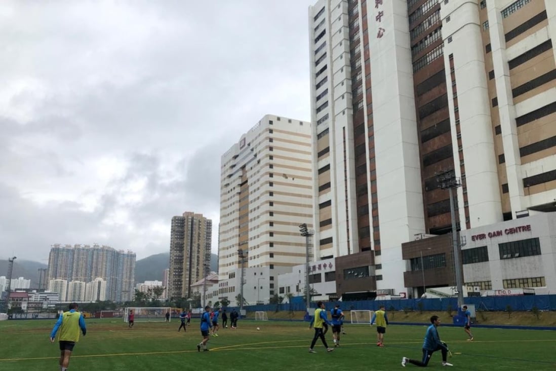 Kitchee players train on the brand-new turf at their training centre in Shek Mun. Photos: Chan Kin-wa