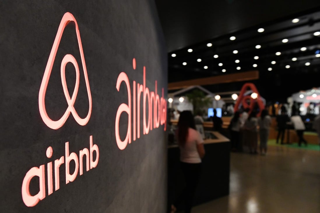 US rental site Airbnb logo is displayed during a press conference in Tokyo. Photo: AFP