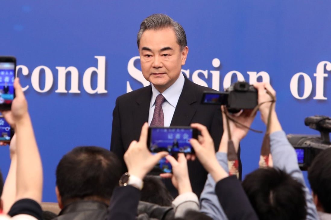 Chinese Foreign Minister Wang Yi arriving at Friday’s press conference in Beijing. Photo: Simon Song