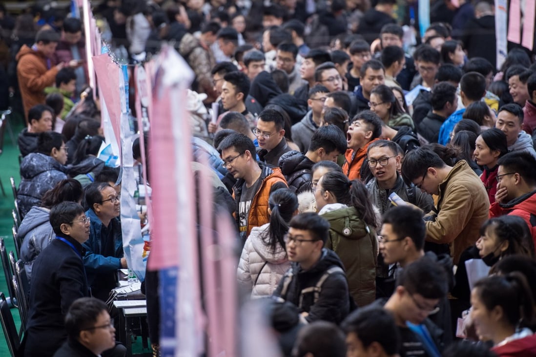 Over 10,000 students from Taiyuan University of Technology, including those who will graduate in 2019 and who graduated in the previous years, look for job opportunities at a job fair held on campus in Taiyuan city, capital city of China’s Shanxi province, on November 17, 2018. Photo: Imaginechina
