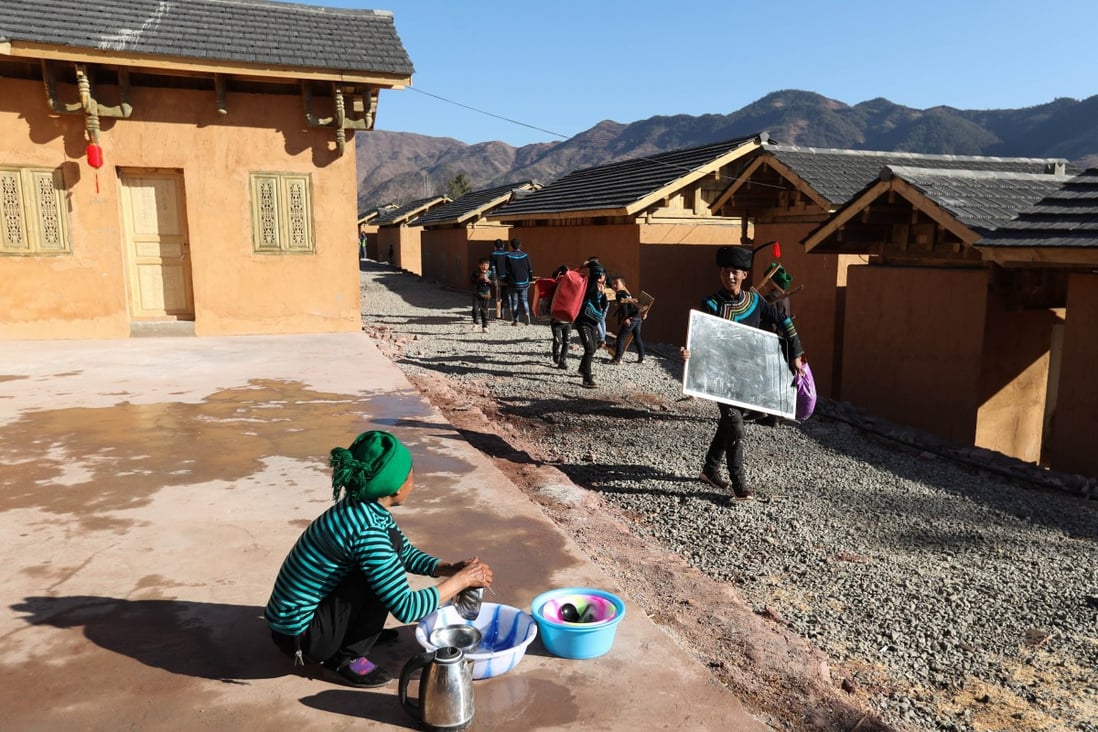 Villagers relocated from impoverished areas move into new homes in the Liangshan Yi autonomous prefecture, Sichuan province. Photo: Xinhua