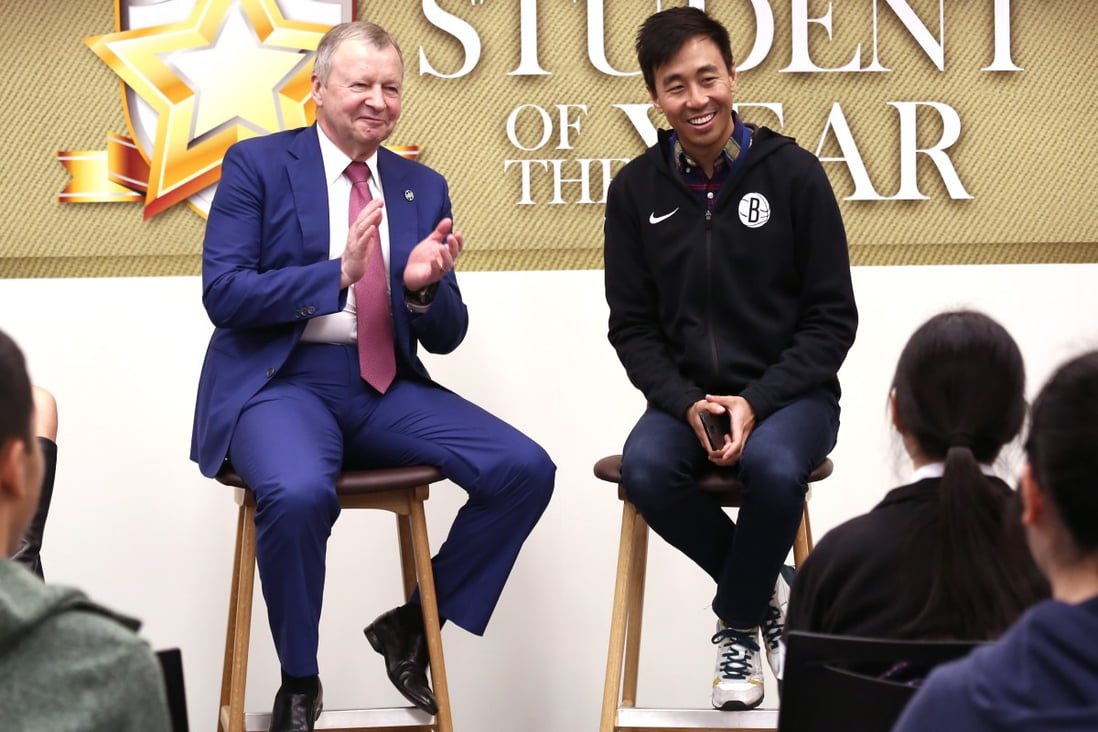South China Morning Post CEO Gary Liu (right) and Hong Kong Jockey Club CEO Winfried Engelbrecht-Bresges share tips with students. Photo: Jonathan Wong