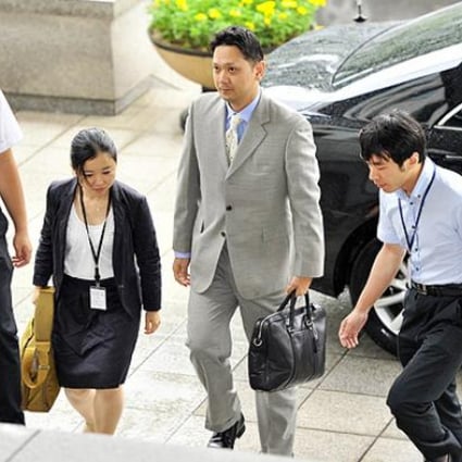 An official from the Japanese embassy in South Korea arrives at the Foreign Ministry in Seoul to receive a diplomatic document on Thursday. Photo: AFP 