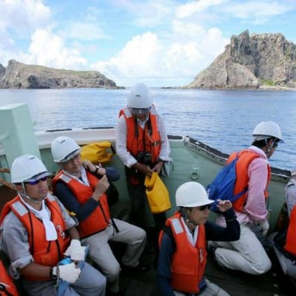 A team of Japanese surveyors sail near a disputed island chain. Photo: AFP