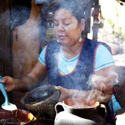 Clockwise from left: a woman prepares mole in the traditional way; knowing how to balance ingredients in a complex mole is not easy; tortillas filled with shredded chicken, cheese and avocado with mole.Photos: Corbis, AFP