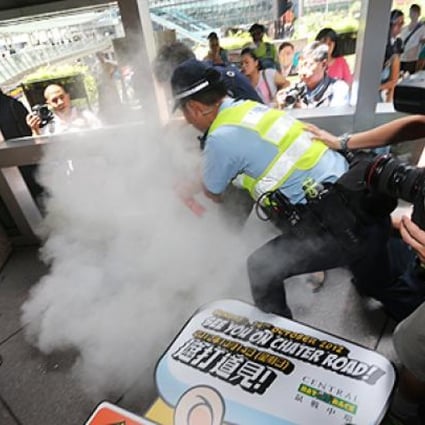 A protest against Japan's proposed purchase of the Diaoyu islands gets out of hand at Exchange Square in Central, Hong Kong, on Wednesday. Photo: David Wong