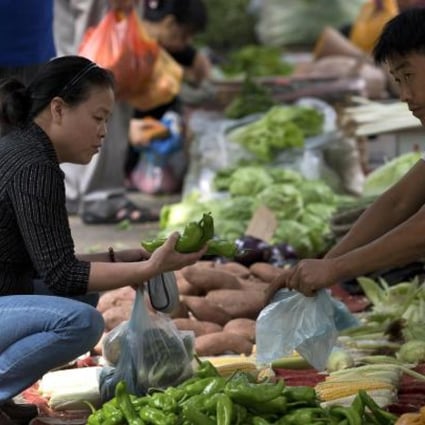 Higher food prices push up inflation, which hits growth. Photo: AP