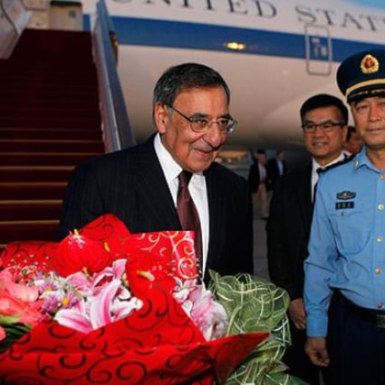 US Defence Secretary Leon Panetta is welcomed by China's Chief of the General's Staff Ma Xiao Tian and US Ambassador to China Gary Locke at Beijing International Airport on Monday. Photo: AFP