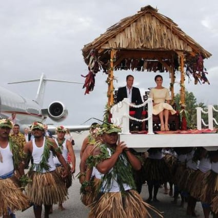 Britain's Prince William and his wife Kate arrive in Tuvalu, as part of their Pacific tour. Photo: AFP